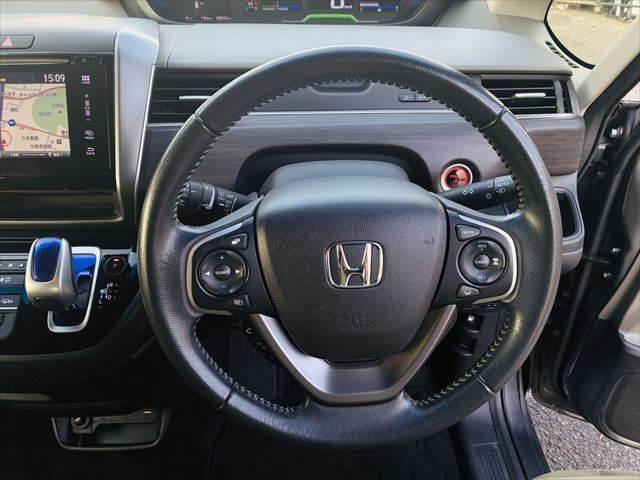 フリードハイブリッド ハイブリッド・ＥＸ　純正メモリーナビ　バックカメラ　両側パワースライドドア　ハーフレザーシート　レーダークルーズコントロール　衝突軽減ブレーキ　シートヒーター　Ｂｌｕｅｔｏｏｔｈ　フルセグＴＶ　ＥＴＣ　ＬＥＤヘッドライト（12枚目）