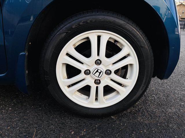 Ｎ－ＢＯＸ ２トーンカラースタイル　Ｇ・Ｌパッケージ　ユーザー買取車　ツートン　パワースライドドア　スマートキー　ベンチシート　電動格納ミラー　ＥＴＣ　純正１４インチアルミホイール　ＣＤチェンジャー　オートエアコン　横滑り防止装置　ハロゲンランプ　ＡＢＳ（11枚目）