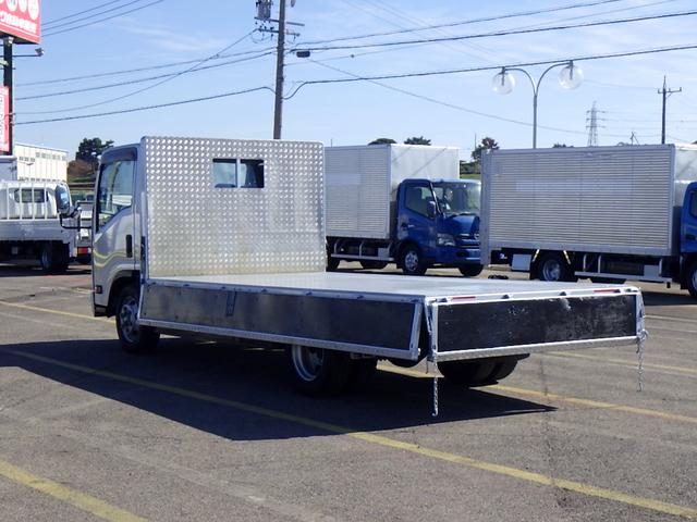 エルフトラック 3.5トン 平ボディー ワイドキャビン 荷台ワイドロング 床鉄板加工 鳥居縞板加工 あおり縞板加工 あおり開閉補助装置 坂道発進補助装置 ETC キーレス 保証書 3500kg 3人乗 6MT(47枚目)