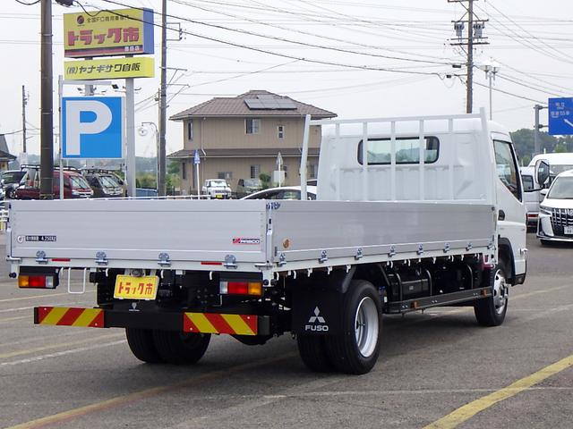 キャンター 　４．２５トン　平ボディ　アルミブロック　ワイド　超ロング　ハイルーフ　後期モデル　荷台床板張り　衝突軽減ブレーキ　車線逸脱警報　横滑り防止装置　ＡＳＲ　スマートキー　４２５０ｋｇ　５ＭＴ（33枚目）