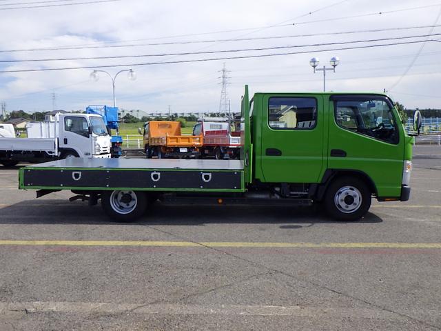 キャンター 　１．９トン　Ｗキャブ　平ボディー　荷台セミワイドロング　リアクーラー　全低床　荷台床鉄板張り　フック３対　ロープ穴３対　衝突軽減　車線逸脱警報　バックカメラ　ドラレコ　ナビＴＶ　１９００ｋｇ　ＡＴ（8枚目）