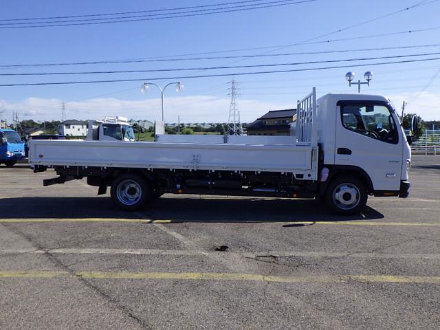 キャンター 2.9トン 平ボディー ワイド超ロング 現行モデル 10インチ液晶メーター 左右アオリバランサー 磁気サスシート 衝突軽減ブレーキ 車線逸脱警報 交通標識認識機能 バックモニター 2900kg AT(5枚目)