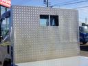 3.5トン 平ボディー ワイドキャビン 荷台ワイドロング 床鉄板加工 鳥居縞板加工 あおり縞板加工 あおり開閉補助装置 坂道発進補助装置 ETC キーレス 保証書 3500kg 3人乗 6MT(12枚目)