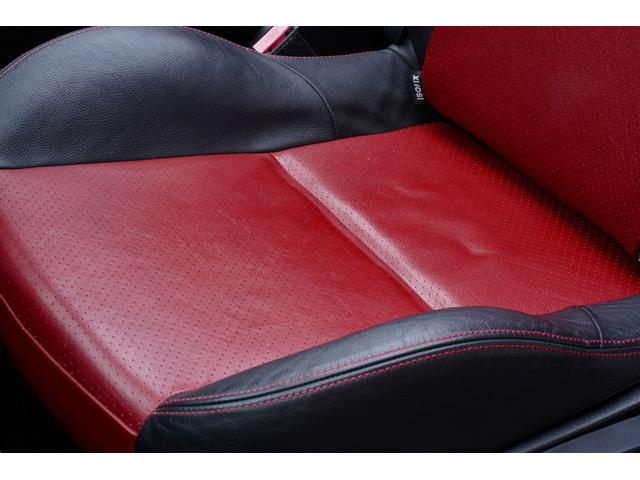CC GT 5速ミッションターボ赤黒コンビレザーシートヒーター付カロッツェリアフルセグ地デジナビETCリアコーナーセンサー禁煙灰皿未使用17インチ電動オープンダッシュレザー張替え済サブウーファースピーカー付(28枚目)