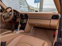 この997カレラSは、単なる中古車ではありません。あなたの人生に新しい章を始める鍵です。マカダミアンメタリックの美しい輝きとベージュ内装の上質な空間が、あなたの毎日を特別なものに変えてくれるでしょう。