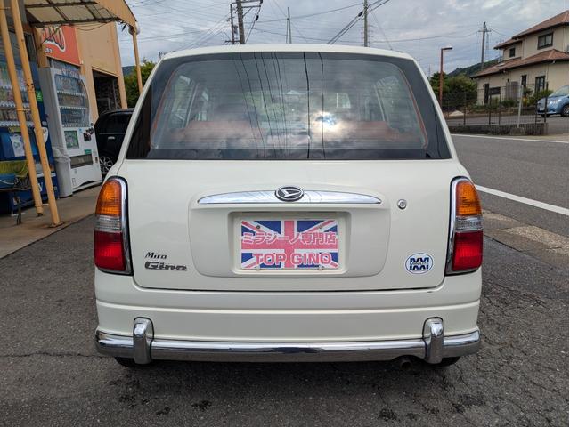 ミラジーノ ジーノ　後期型　タイベル交換済　保証６か月　シートカバー　社外ホイールキャップ　フォグランプグリル　ピアノブラック調パーツ　ローダウン（6枚目）