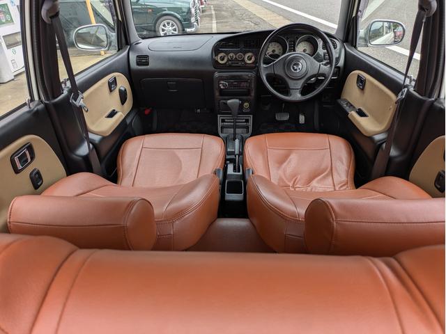 ミラジーノ ジーノ　後期型　タイベル交換済　保証６か月　シートカバー　社外ホイールキャップ　フォグランプグリル　ピアノブラック調パーツ　ローダウン（26枚目）
