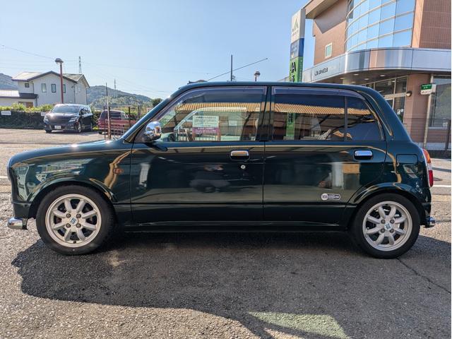 ミラジーノ ミニライトスペシャルターボ　全塗装　ルーフホワイト　ターボ車　タイベル交換済　タイヤ新品　車検整備付　保証６ヶ月　新品シートカバー　ウッド調パーツ　ナビ　ＥＴＣ（4枚目）