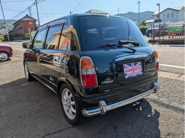 ミラジーノ ミニライトスペシャルターボ　全塗装　ルーフホワイト　ターボ車　タイベル交換済　タイヤ新品　車検整備付　保証６ヶ月　新品シートカバー　ウッド調パーツ　ナビ　ＥＴＣ（5枚目）