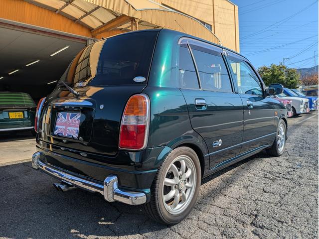 ミラジーノ ミニライトスペシャルターボ　全塗装　ルーフホワイト　ターボ車　タイベル交換済　タイヤ新品　車検整備付　保証６ヶ月　新品シートカバー　ウッド調パーツ　ナビ　ＥＴＣ（7枚目）