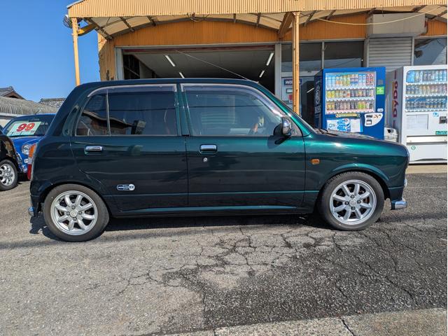 ミラジーノ ミニライトスペシャルターボ　全塗装　ルーフホワイト　ターボ車　タイベル交換済　タイヤ新品　車検整備付　保証６ヶ月　新品シートカバー　ウッド調パーツ　ナビ　ＥＴＣ（8枚目）