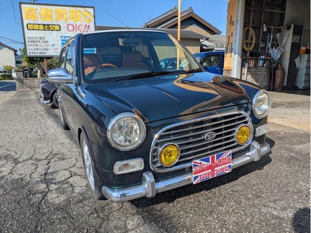 ミラジーノ ミニライトスペシャルターボ　全塗装　ルーフホワイト　ターボ車　タイベル交換済　タイヤ新品　車検整備付　保証６ヶ月　新品シートカバー　ウッド調パーツ　ナビ　ＥＴＣ（9枚目）