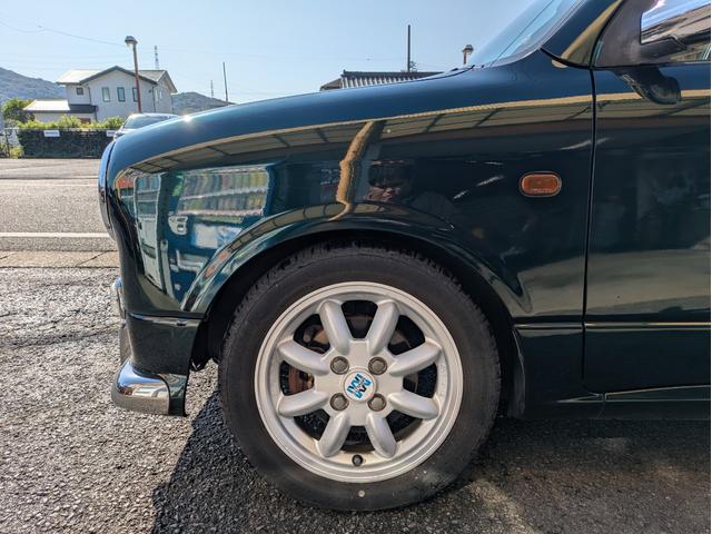 ミラジーノ ミニライトスペシャルターボ　全塗装　ルーフホワイト　ターボ車　タイベル交換済　タイヤ新品　車検整備付　保証６ヶ月　新品シートカバー　ウッド調パーツ　ナビ　ＥＴＣ（15枚目）