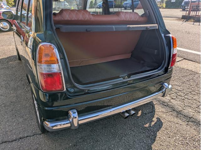 ミラジーノ ミニライトスペシャルターボ　全塗装　ルーフホワイト　ターボ車　タイベル交換済　タイヤ新品　車検整備付　保証６ヶ月　新品シートカバー　ウッド調パーツ　ナビ　ＥＴＣ（19枚目）