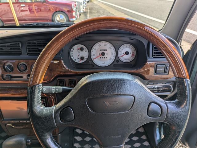 ミラジーノ ミニライトスペシャルターボ　全塗装　ルーフホワイト　ターボ車　タイベル交換済　タイヤ新品　車検整備付　保証６ヶ月　新品シートカバー　ウッド調パーツ　ナビ　ＥＴＣ（22枚目）