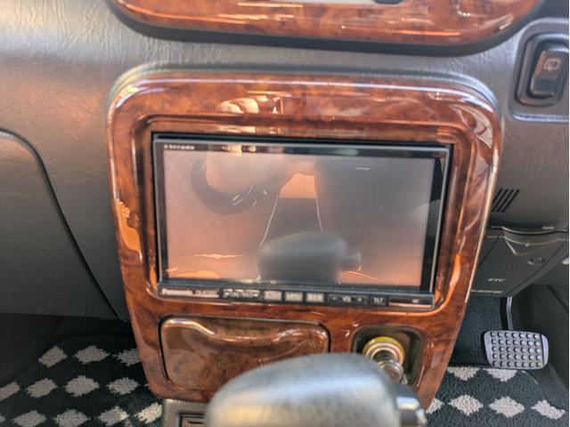 ミラジーノ ミニライトスペシャルターボ　全塗装　ルーフホワイト　ターボ車　タイベル交換済　タイヤ新品　車検整備付　保証６ヶ月　新品シートカバー　ウッド調パーツ　ナビ　ＥＴＣ（24枚目）