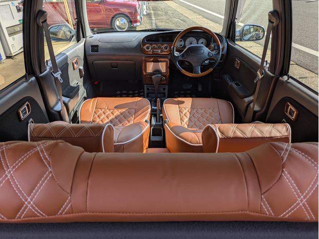 ミラジーノ ミニライトスペシャルターボ　全塗装　ルーフホワイト　ターボ車　タイベル交換済　タイヤ新品　車検整備付　保証６ヶ月　新品シートカバー　ウッド調パーツ　ナビ　ＥＴＣ（34枚目）