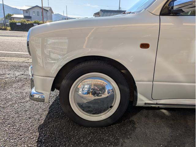 ミラジーノ ジーノ　同色全塗装　ウッド調パーツ　タイベル交換済　保証６ヶ月　走行無制限　　車検整備付き　ローダウン　新品シートカバー　社外ホイールキャップ　タイヤ新品（21枚目）