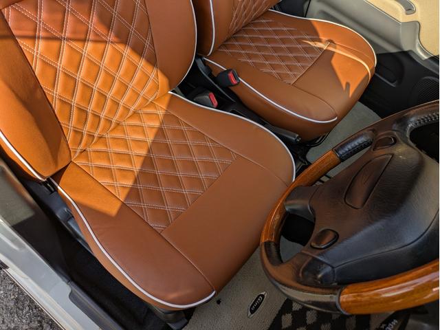 ミラジーノ ジーノ　同色全塗装　ウッド調パーツ　タイベル交換済　保証６ヶ月　走行無制限　　車検整備付き　ローダウン　新品シートカバー　社外ホイールキャップ　タイヤ新品（32枚目）