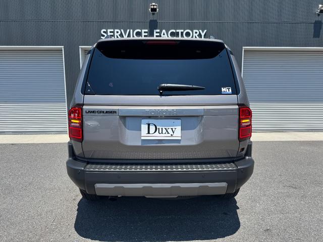 ランドクルーザー250 VX サンルーフ パノラミックビューモニター デジタルインナーミラー ブラインドスポットモニター 純正18インチアルミホイール 電動リアゲート おアワーバックドア ルーフレール トヨタチームメイト(24枚目)