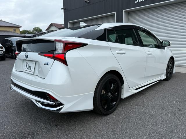 プリウス Ｓツーリングセレクション・ブラックエディション　８インチディスプレイオーディオ　モデリスタエアロ　ＴＶ視聴　パノラミックビューモニター　シートヒーター　ＡＣ１００Ｖ　純正１７インチアルミホイール　クルーズコントロール　ＥＴＣ２．０　ドラレコ」前後（25枚目）