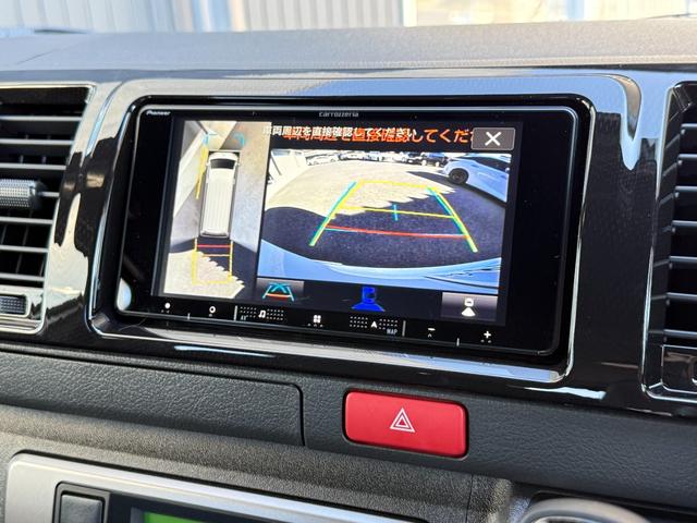 ハイエースバン 7インチナビ デジタルミラー 両側PWスライド パノラミックビュー 4WD バックカメラ TV ステアリングスイッチ 純正タイヤ プッシュスタート オートハイビーム スペアタイヤ 電動格納ミラー(4枚目)