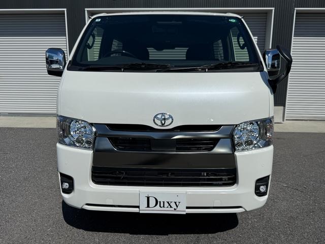 ハイエースバン 7インチナビ デジタルミラー 両側PWスライド パノラミックビュー 4WD バックカメラ TV ステアリングスイッチ 純正タイヤ プッシュスタート オートハイビーム スペアタイヤ 電動格納ミラー(10枚目)