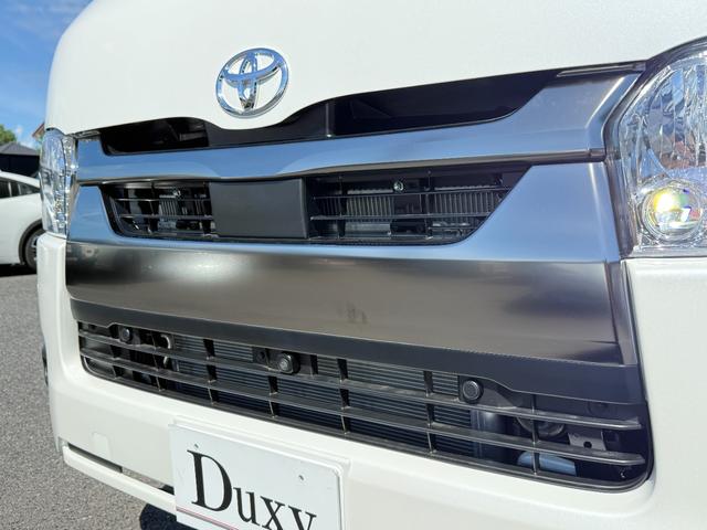 ハイエースバン 7インチナビ デジタルミラー 両側PWスライド パノラミックビュー 4WD バックカメラ TV ステアリングスイッチ 純正タイヤ プッシュスタート オートハイビーム スペアタイヤ 電動格納ミラー(18枚目)