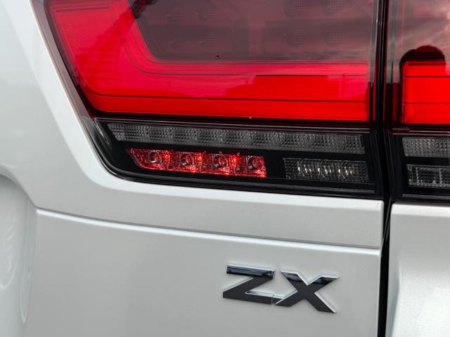 ランドクルーザー ＺＸ　モデリスタエアロフェンダー　ＪＢＬサウンド　リヤデフロック　ルーフレール　トノカバー　クールＢＯＸ　リアエンターテイメント　寒冷地仕様　空気圧センサー（8枚目）