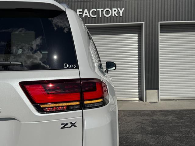 ランドクルーザー ZX 2025年改モデル 特別限定ローン 12.3型プレミアムサウンドナビ サンルーフ リアエンターテイメントシステム リヤ電動デフロック 寒冷地 モデリスタエアロキット USB充電タイプC フルセグTV(32枚目)