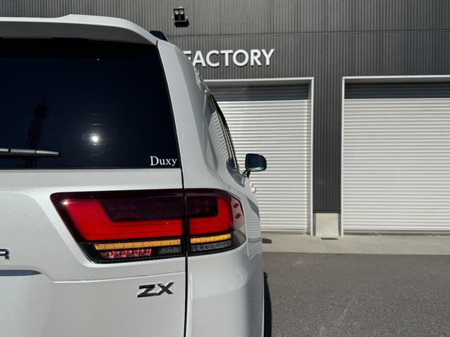 ランドクルーザー ＺＸ　２０２５年改モデル　１２．３型プレミアムサウンドナビ　リヤエンターテイメントシステム　ヒッチメンバー　クールＢＯＸ　タイヤ空気圧センサー　寒冷地仕様　ＴＶ　ＨＤＭＩ　　ＥＴＣ２．０　内装ベージュ（24枚目）