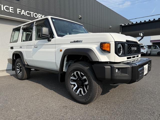 ランドクルーザー７０ ＡＸ　純正フルセグナビ　電動デフロック　ＪＡＯＳフロントガーニッシュ　Ｆアンダーカバー　Ｒアンダーカバー　木目調ステアリング　丸目ヘッドランプ　自動防舷ミラー　オートクルーズコントロール　純正１６ＡＷ（13枚目）