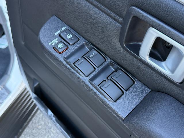 ランドクルーザー７０ ＡＸ　純正フルセグナビ　電動デフロック　ＪＡＯＳフロントガーニッシュ　Ｆアンダーカバー　Ｒアンダーカバー　木目調ステアリング　丸目ヘッドランプ　自動防舷ミラー　オートクルーズコントロール　純正１６ＡＷ（33枚目）