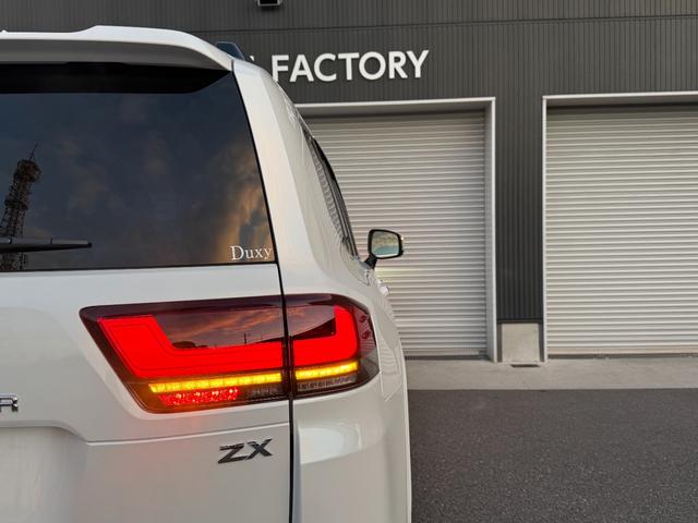 ランドクルーザー ＺＸ　１２．３型プレミアムサウンドナビ　リアエンターテイメントシステム　リヤ電動デフロック　クールＢＯＸ　空気圧センサー　　寒冷地仕様　ヒッチメンバー　モデリスタエアロ　ＨＤＭＩ　ＣＤ／ＤＶＤ　ＥＴＣ（35枚目）