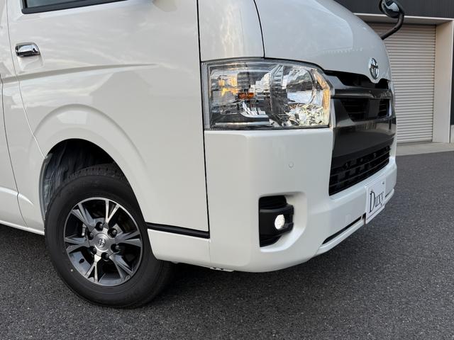 ハイエースバン ロングスーパーＧＬ　ダークプライムＳ　特別限定ローン　デジタルミラー　両側パワースライドドア　パノラミックビューモニター　バックカメラ　プロジェクター式ＬＥＤヘッドライト　ＬＥＤフォグランプ　ハーフレザーシート　スペアタイヤ　純正１５ＡＷ（12枚目）