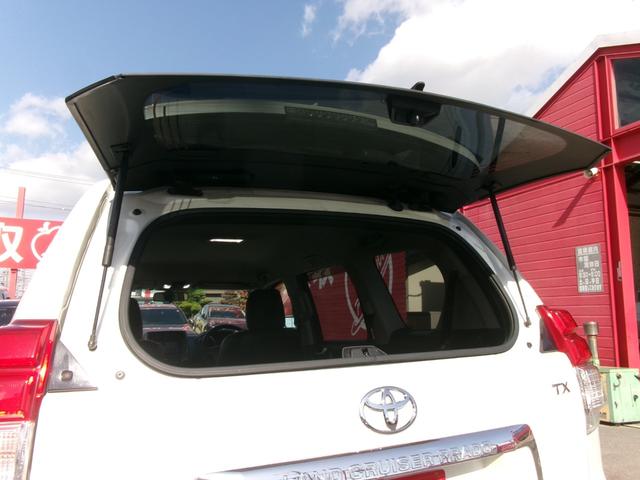 ランドクルーザープラド TX 純正ナビTV バックカメラ スマートキー×2 ETC 純正ホイール車内積込み フルセグTV Bluetooth 黒シートカバー LEDヘッド プッシュスタート クリアランスソナー 電格ミラー 社外AW(61枚目)