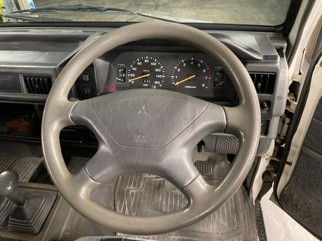 デリカバン ＤＸ　５ドア　４ＷＤ　５速マニュアル　４Ｇ６３キャブレターガソリンエンジン　ＮＯｘ・ＰＭ適合　４ナンバー貨物（12枚目）