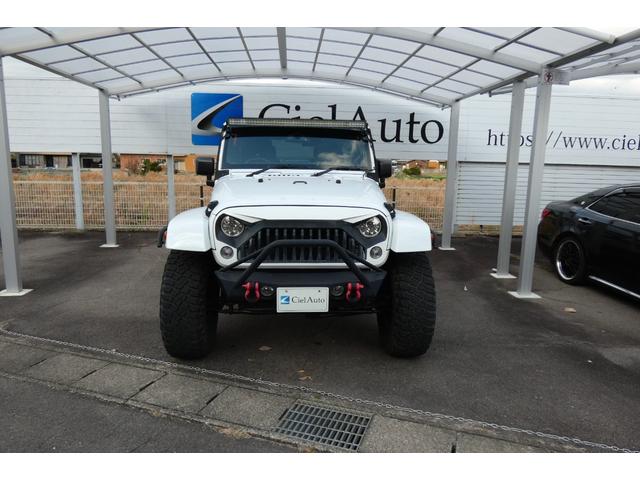 ジープ・ラングラーアンリミテッド サハラ　切替４ＷＤ　ＲＡＮＣＨＯリフトアップ　１７インチＡＷ　ＬＥＤヘッド　オートクルーズ　ｃａｒｒｏｚｅｒｉａナビ　ＤＶＤ再生　フルセグ　Ｂｌｕｅｔｏｏｔｈ　ＥＴＣ　フロント・サイド・バックカメラ（5枚目）