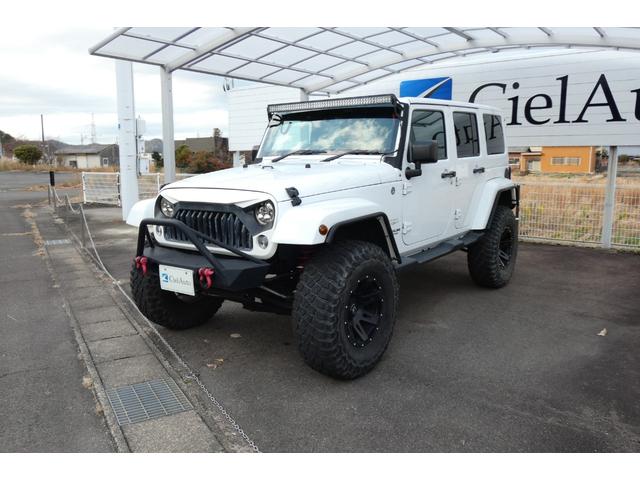 ジープ・ラングラーアンリミテッド サハラ　切替４ＷＤ　ＲＡＮＣＨＯリフトアップ　１７インチＡＷ　ＬＥＤヘッド　オートクルーズ　ｃａｒｒｏｚｅｒｉａナビ　ＤＶＤ再生　フルセグ　Ｂｌｕｅｔｏｏｔｈ　ＥＴＣ　フロント・サイド・バックカメラ（7枚目）