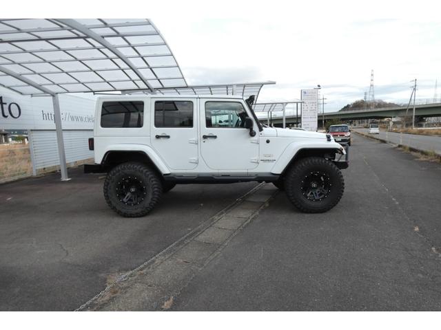 ジープ・ラングラーアンリミテッド サハラ　切替４ＷＤ　ＲＡＮＣＨＯリフトアップ　１７インチＡＷ　ＬＥＤヘッド　オートクルーズ　ｃａｒｒｏｚｅｒｉａナビ　ＤＶＤ再生　フルセグ　Ｂｌｕｅｔｏｏｔｈ　ＥＴＣ　フロント・サイド・バックカメラ（9枚目）