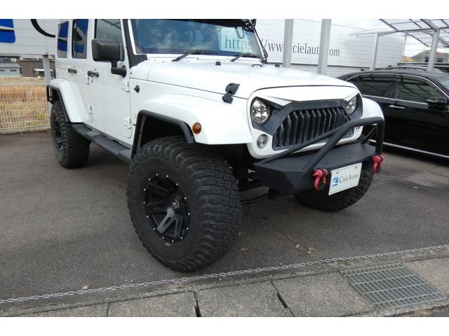 ジープ・ラングラーアンリミテッド サハラ　切替４ＷＤ　ＲＡＮＣＨＯリフトアップ　１７インチＡＷ　ＬＥＤヘッド　オートクルーズ　ｃａｒｒｏｚｅｒｉａナビ　ＤＶＤ再生　フルセグ　Ｂｌｕｅｔｏｏｔｈ　ＥＴＣ　フロント・サイド・バックカメラ（15枚目）