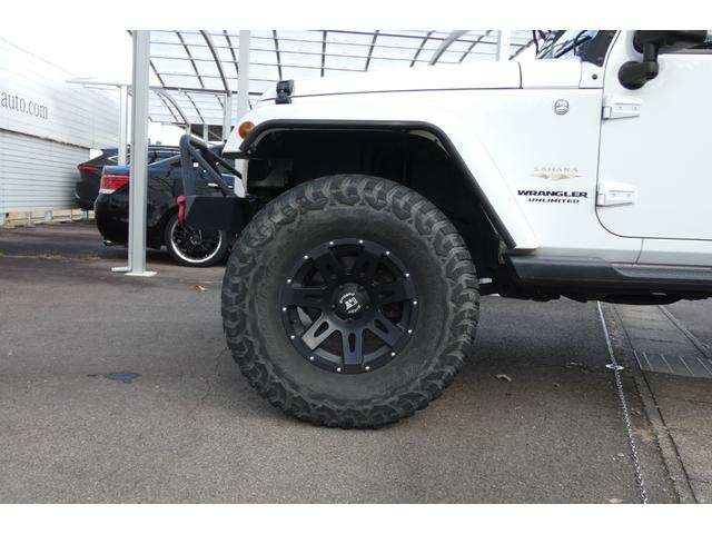ジープ・ラングラーアンリミテッド サハラ　切替４ＷＤ　ＲＡＮＣＨＯリフトアップ　１７インチＡＷ　ＬＥＤヘッド　オートクルーズ　ｃａｒｒｏｚｅｒｉａナビ　ＤＶＤ再生　フルセグ　Ｂｌｕｅｔｏｏｔｈ　ＥＴＣ　フロント・サイド・バックカメラ（18枚目）