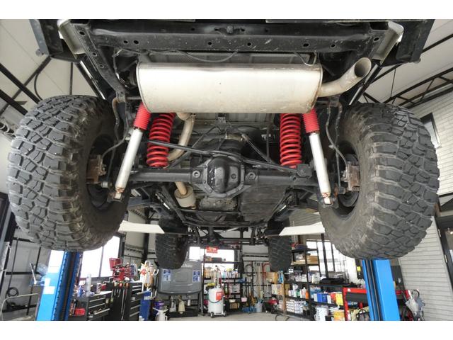 ジープ・ラングラーアンリミテッド サハラ　切替４ＷＤ　ＲＡＮＣＨＯリフトアップ　１７インチＡＷ　ＬＥＤヘッド　オートクルーズ　ｃａｒｒｏｚｅｒｉａナビ　ＤＶＤ再生　フルセグ　Ｂｌｕｅｔｏｏｔｈ　ＥＴＣ　フロント・サイド・バックカメラ（54枚目）