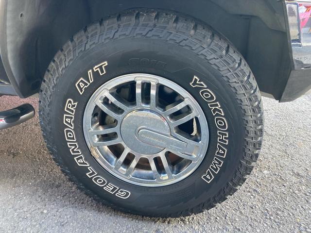 ハマーＨ３ 　タイプＧ　ディーラー車　４ＷＤ　左ハンドル　社外ナビ　Ｂカメラ　ＴＶ　ＥＴＣ　レザーシート　パワーシート　サンルーフ　オートライト　アルミホイール　シートヒーター　ＣＤ　ミュージックプレイヤー接続可（13枚目）
