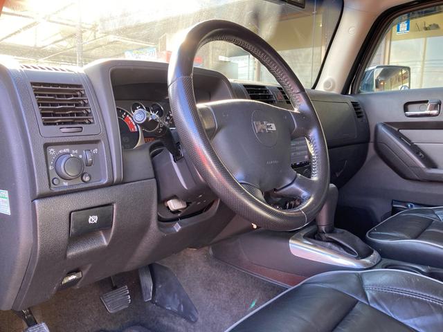 ハマーＨ３ 　タイプＧ　ディーラー車　４ＷＤ　左ハンドル　社外ナビ　Ｂカメラ　ＴＶ　ＥＴＣ　レザーシート　パワーシート　サンルーフ　オートライト　アルミホイール　シートヒーター　ＣＤ　ミュージックプレイヤー接続可（65枚目）