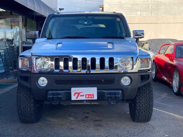 ハマーＨ３ タイプＧ　ディーラー車　右Ｈ　４ＷＤ　サンルーフ　レザーシート　社外１７ＡＷ　社外ナビ　ＴＶ　バックカメラ　サイドカメラ　ＥＴＣ　ヒッチメンバー　マッドガード　社外マフラー　シートヒーター　キーレス　記録簿あり（2枚目）