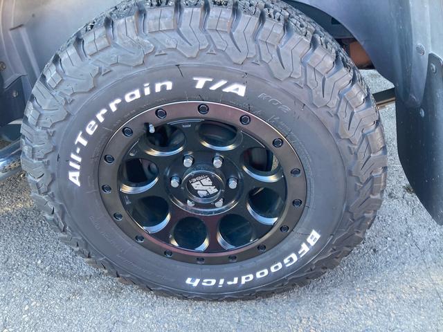 ハマーＨ３ タイプＧ　ディーラー車　右Ｈ　４ＷＤ　サンルーフ　レザーシート　社外１７ＡＷ　社外ナビ　ＴＶ　バックカメラ　サイドカメラ　ＥＴＣ　ヒッチメンバー　マッドガード　社外マフラー　シートヒーター　キーレス　記録簿あり（22枚目）