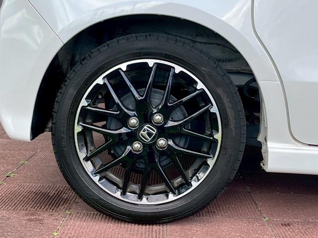 N-BOXカスタム ターボコーディネートスタイル 9インチナビ 10インチリア席モニター ハイグレードスピーカー オートリトラミラー 左右独立式リアセンターアームレスト グレーステッチ本革巻ステアリングホイール パドルシフト(16枚目)