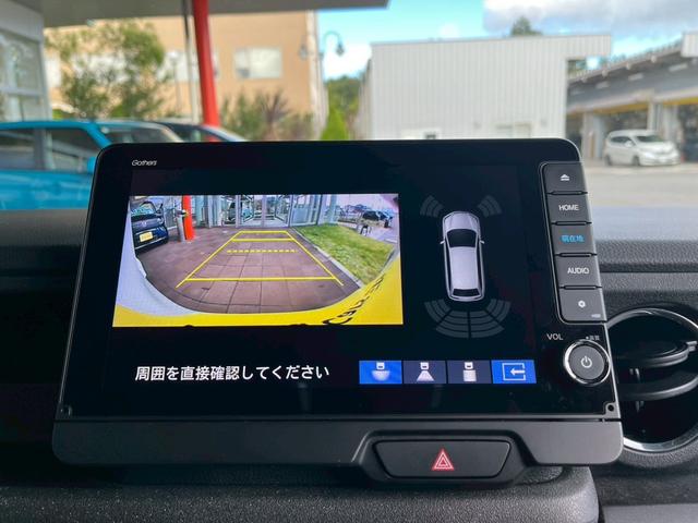 N-BOXカスタム ターボコーディネートスタイル 9インチナビ 10インチリア席モニター ハイグレードスピーカー オートリトラミラー 左右独立式リアセンターアームレスト グレーステッチ本革巻ステアリングホイール パドルシフト(17枚目)