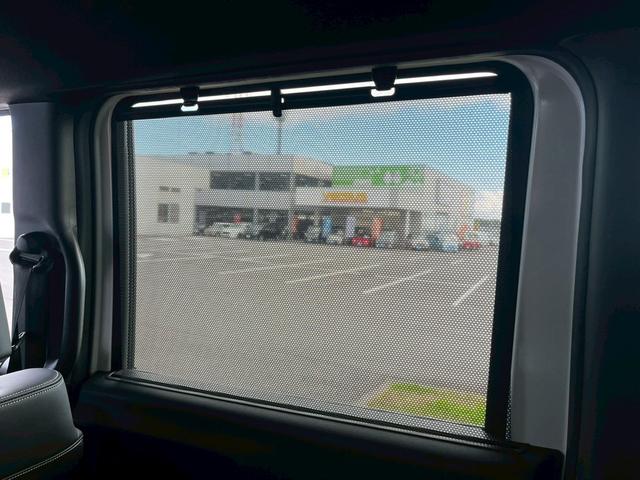 N-BOXカスタム ターボコーディネートスタイル 9インチナビ 10インチリア席モニター ハイグレードスピーカー オートリトラミラー 左右独立式リアセンターアームレスト グレーステッチ本革巻ステアリングホイール パドルシフト(29枚目)